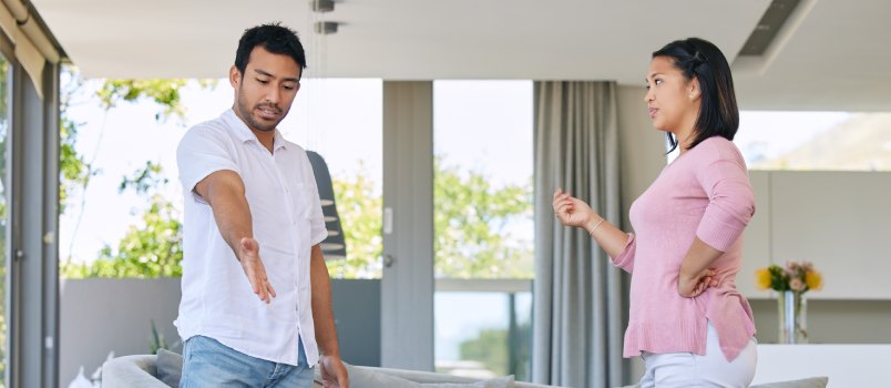 Couple arguing in front of daughter