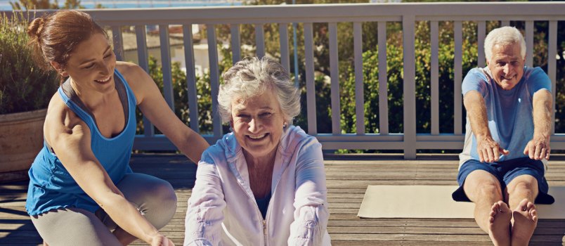 Senior couple doing yoga together
