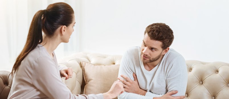 Pleasant couple talking each other