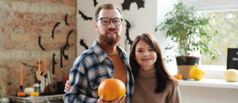 Man holding pumpkin 