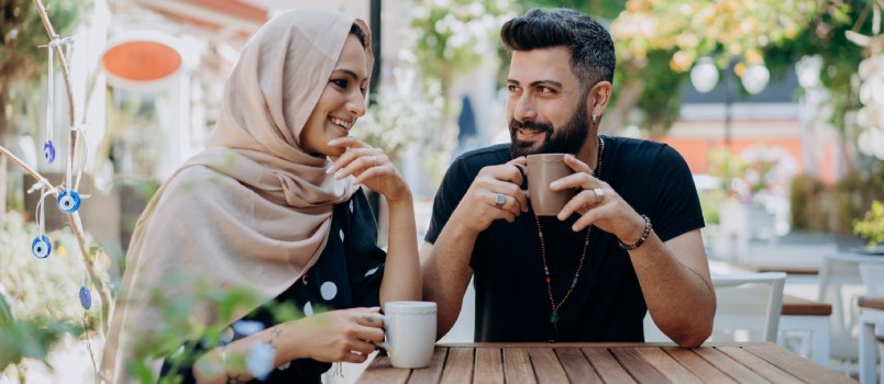 Man and women having cup of coffee 