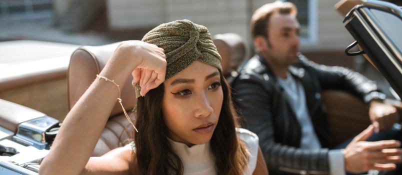 Couple sitting in car