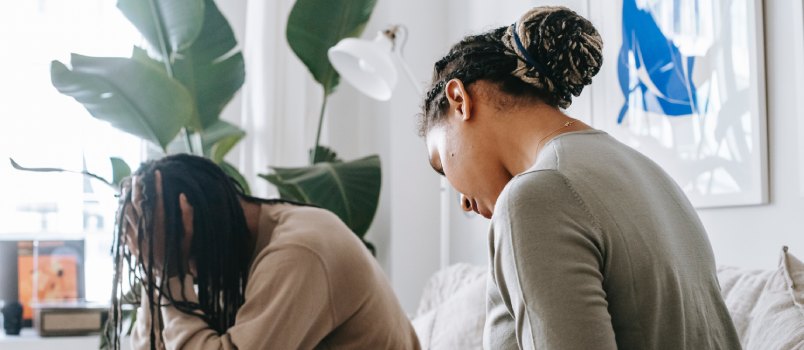 Frustrated couple having session with therapist