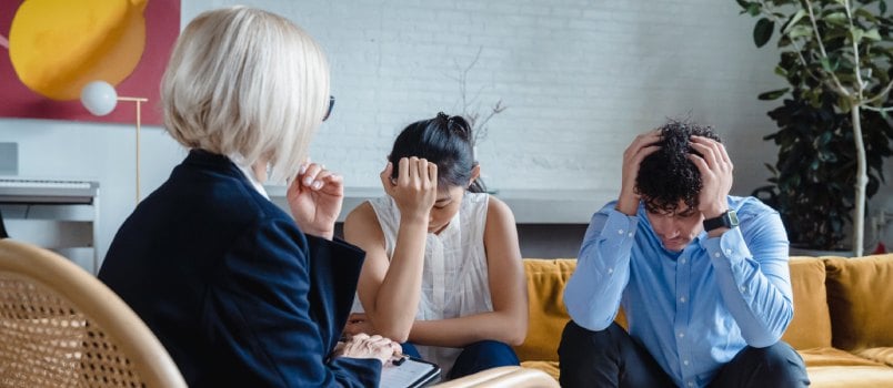 Young couple talking to therapist
