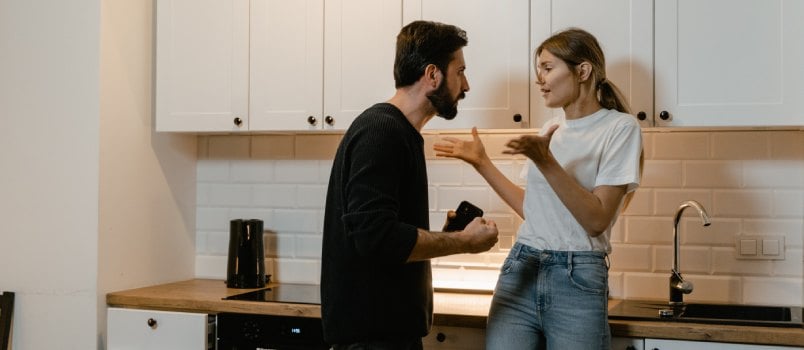 Couple arguing in the kitchen