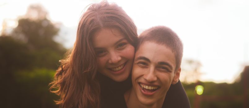 Man and woman smiling