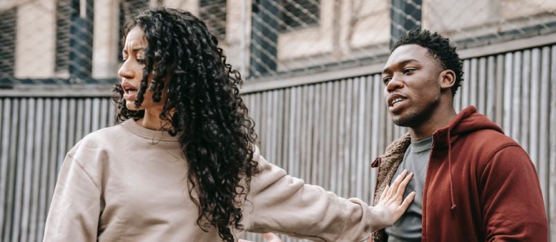 Couple fighting on street