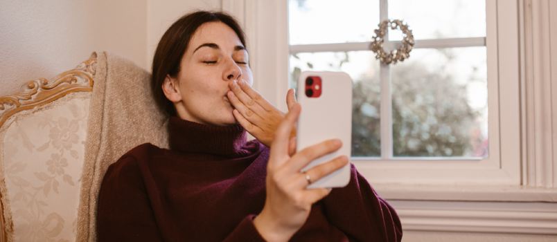 Woman having video call