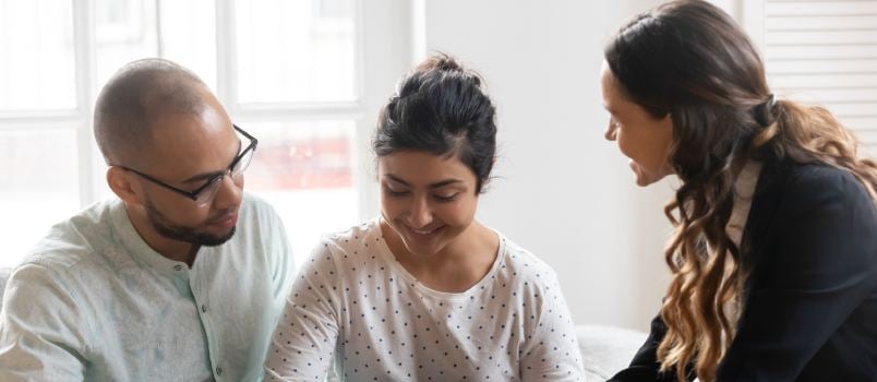 Happy couple making client