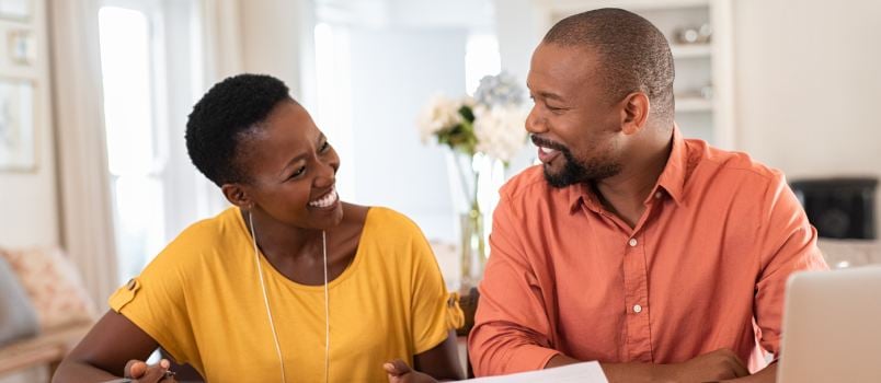 Mature couple managing finance