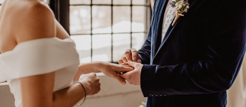 Man and woman holding each other hand