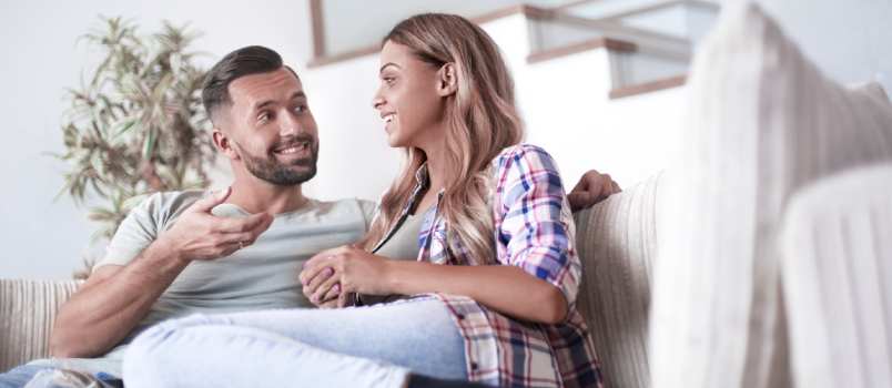 Couple relaxing on couch