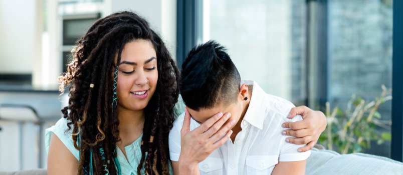 Woman consoling her partner