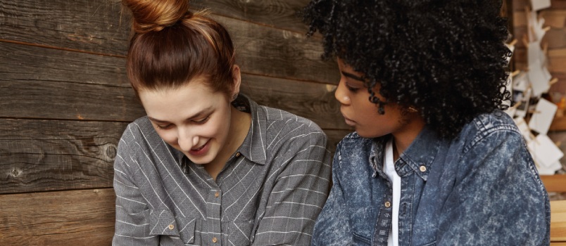 Beautiful couple talking in cafe
