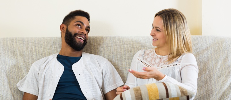 Young couple relaxing on couch