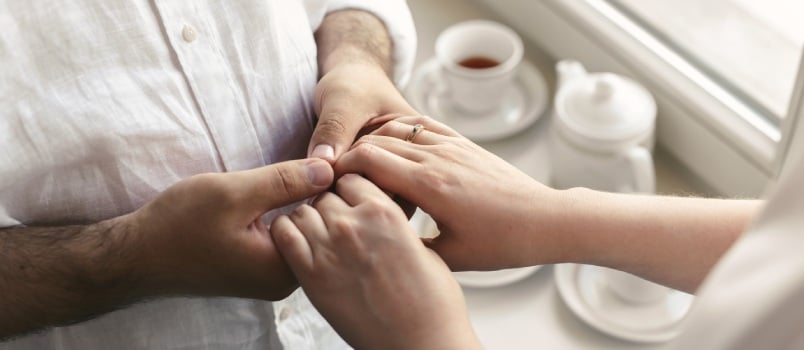 Couple holding hands