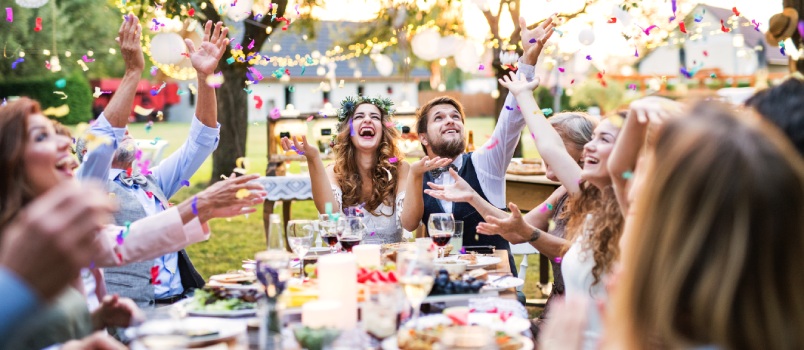 Bride and groom having wedding reception party