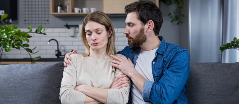 Couple siting on couch