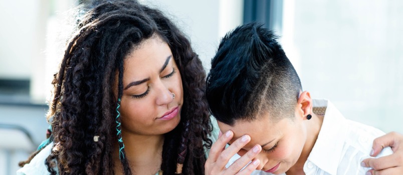 Woman consoling her partner