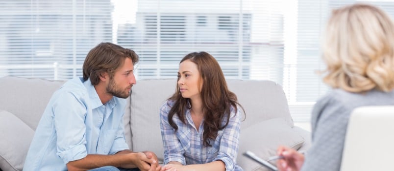 Couple looking at each other during therapy