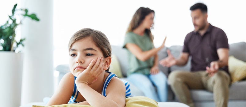 Parents arguing in front of child