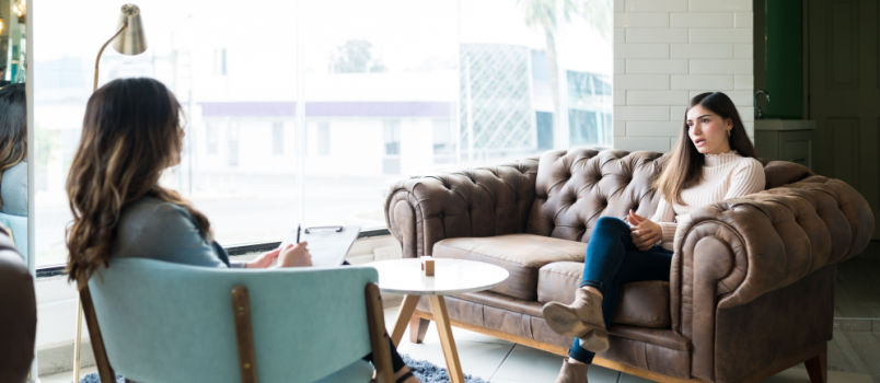 Woman sharing problem with therapist