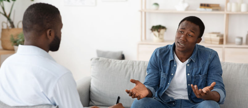 Stressed man explaining his problem