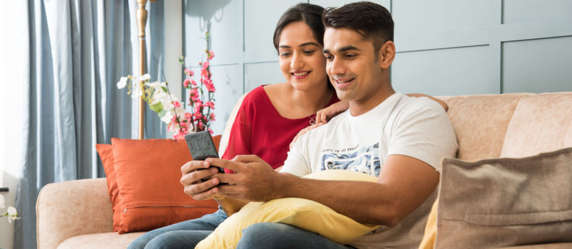Couple using smartphone