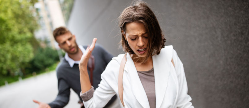 Man trying to talking to woman
