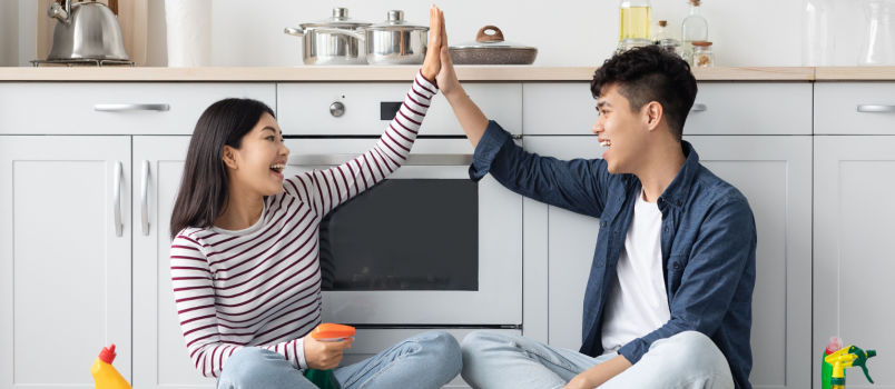 Happy couple enjoying in kitchen