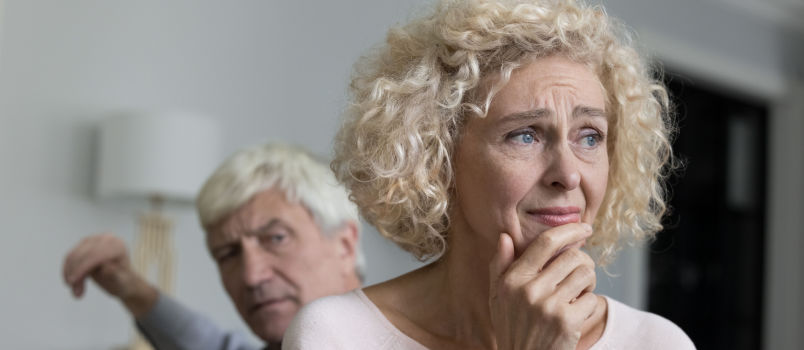 Disappointed older happy man