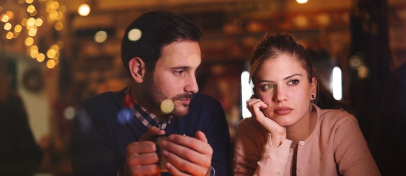 Sad couple having conflict in relationship