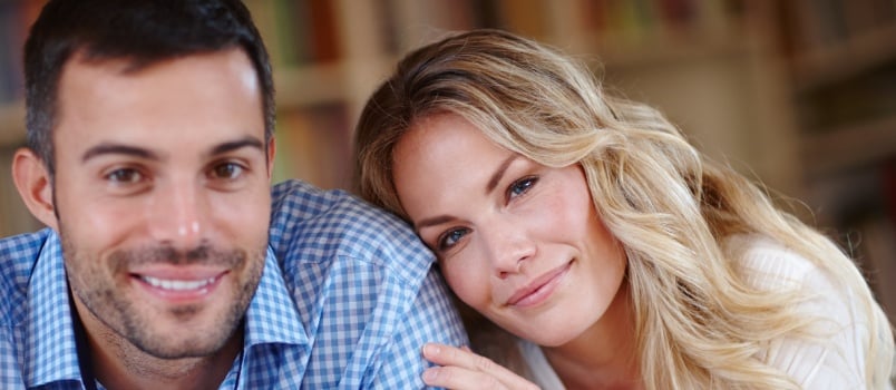 Young couple sitting at table