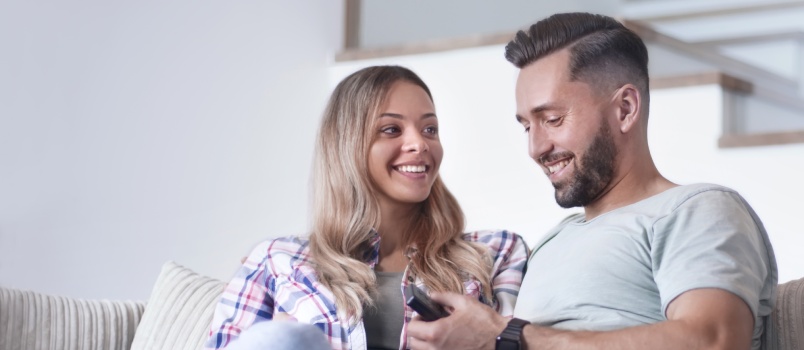 Couple sitting on couch