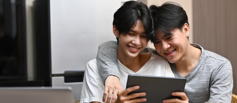 Couple using digital tab