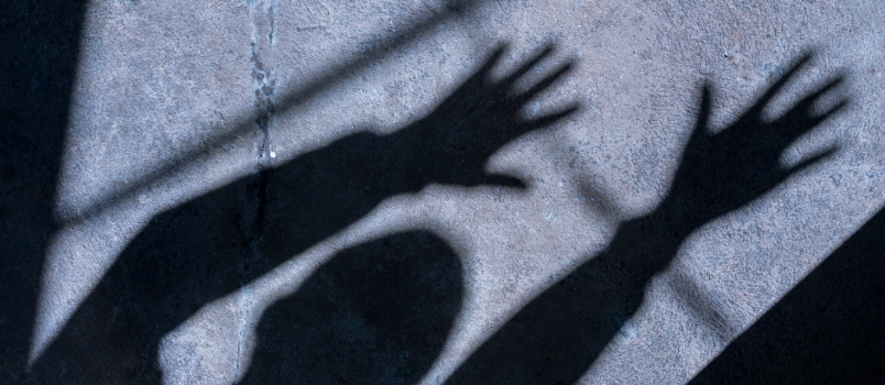 Shadow of man hand reaching out