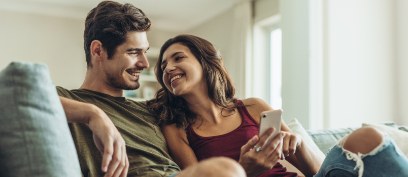 Couple sitting on couch