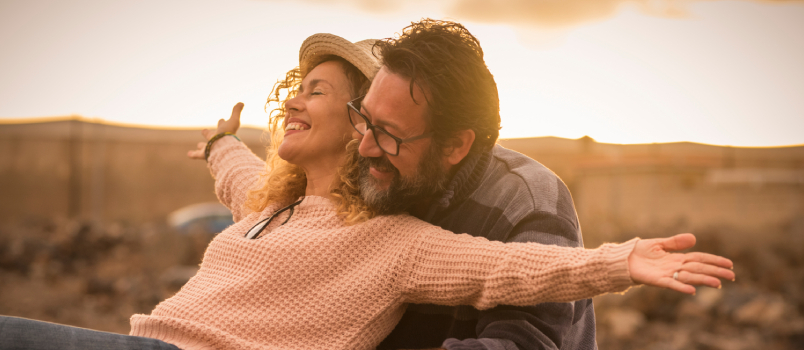 Happy couple enjoying outside