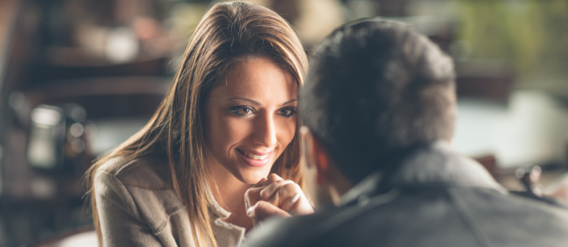Romantic young couple flirting