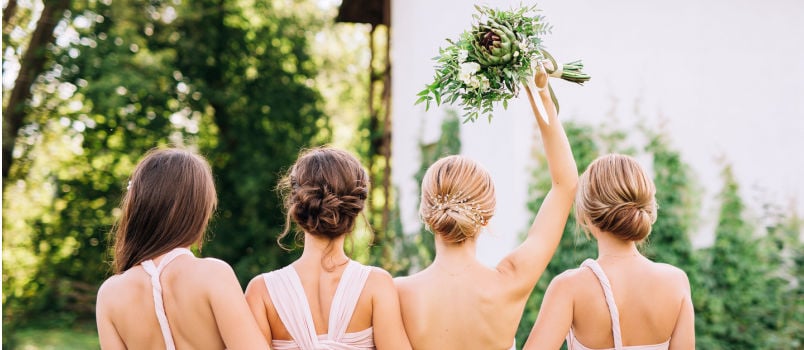 Bride standing with her friends