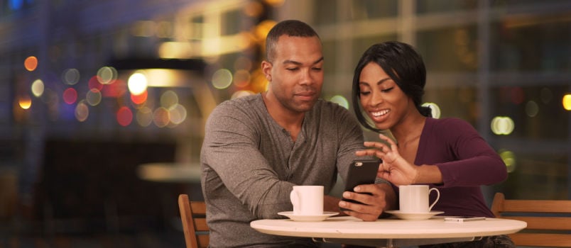 Couple using smartphone