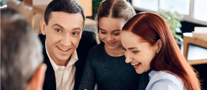 Happy family receiving cash compensation