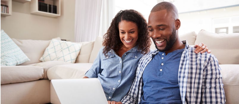 couple using laptop
