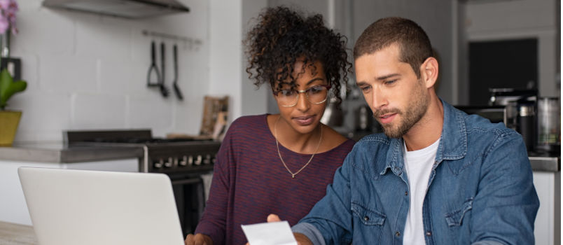 Couple checking bills