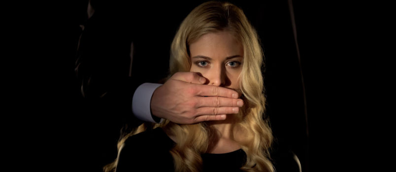 Man covering woman face