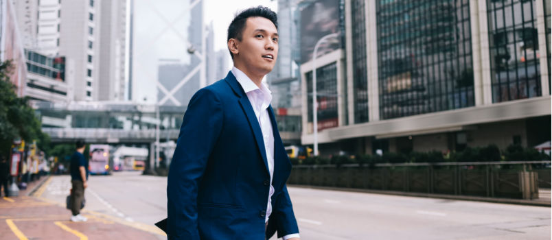 Business man walking on street