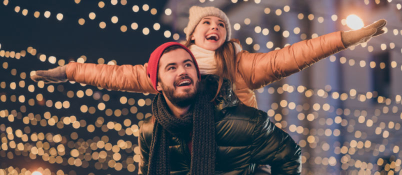 Positive couple having Christmas fun