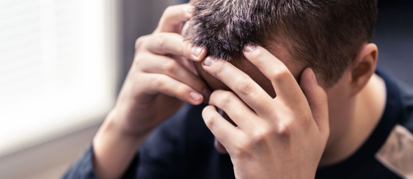 Frustrated man sitting