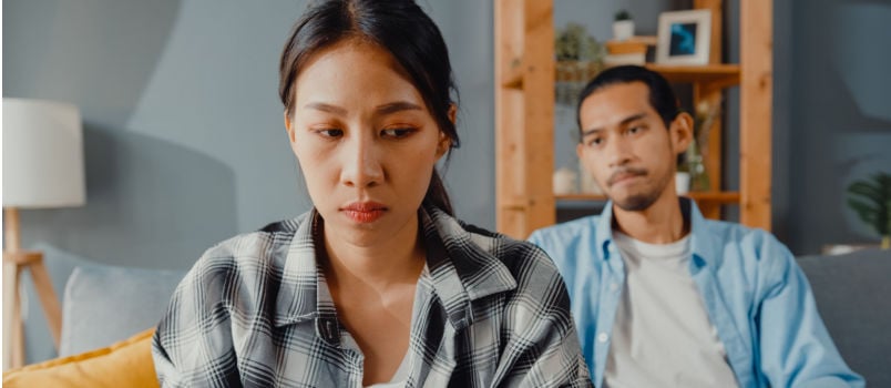 Upset asian couple