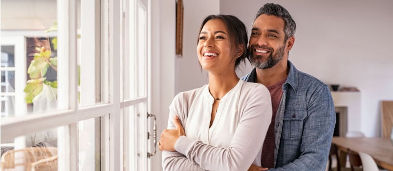 Mid age couple hugging each other